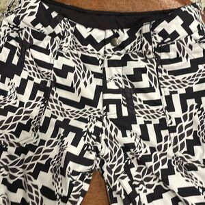 Burton Lucky DryRide Pant size M. Zippers and snaps all good. Hems worn some.